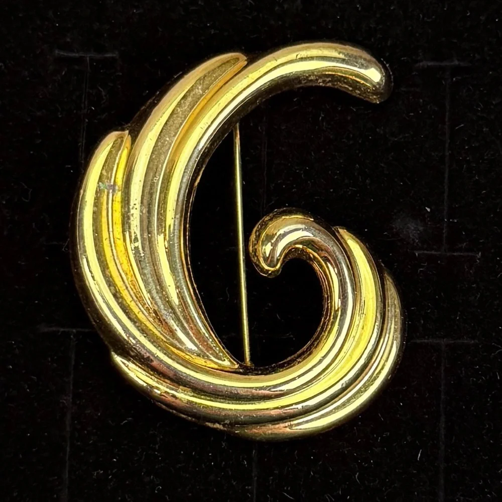 Vintage Goldtone Weighted Swirl Brooch